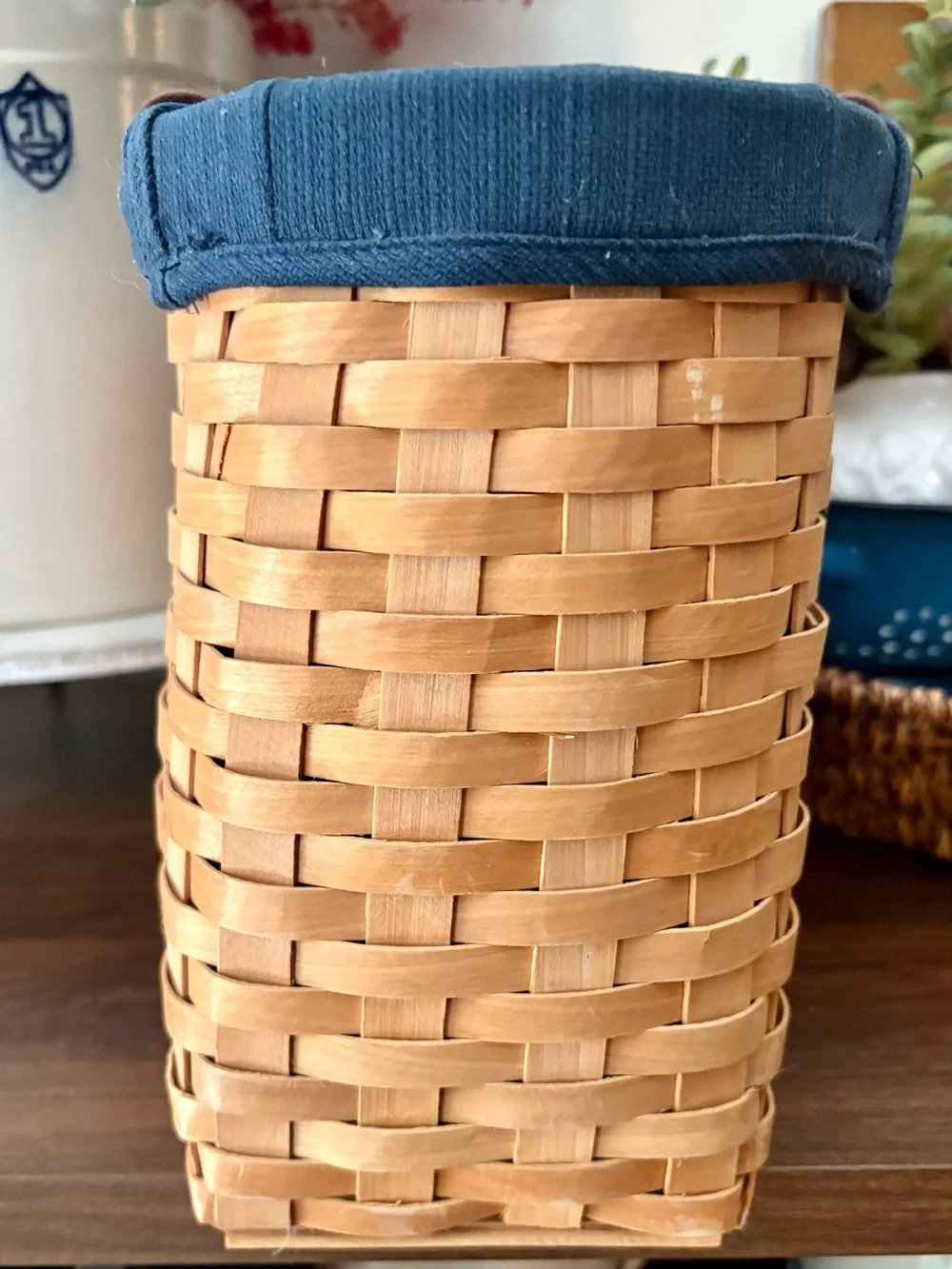Natural Wicker Basket with Navy Fabric Trim and faux leather handles